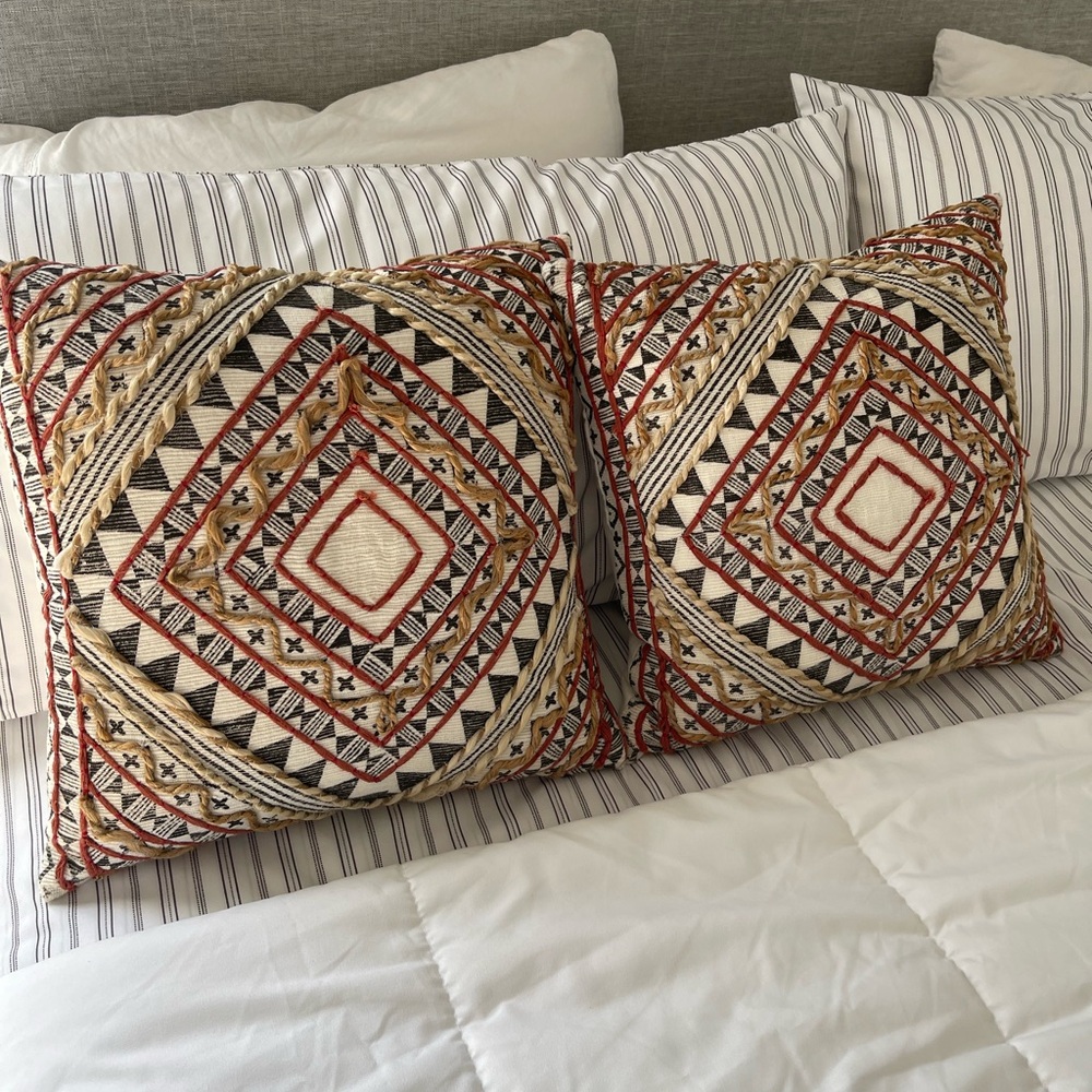 2 Surya cotton and jute pillows